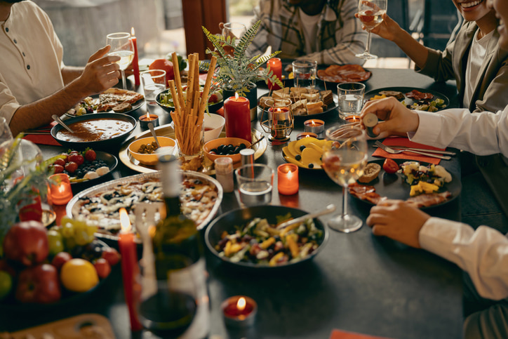 Gathering table with festive food and decor